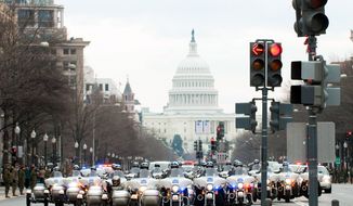** FILE ** A formation of police motorcycles leads the dress rehearsal of the inauguration parade in 2009. (Michael Connor / The Washington Times)