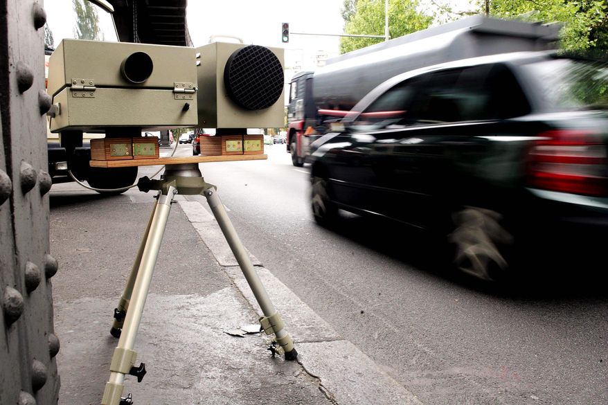 BERLIN - AUGUST 30: A speed camera of the German police monitors speeding automobile drivers on a busy street August 30, 2006 in Berlin, Germany. Germany has stringent laws on speeding and most German drivers experience a suspension of their licence at some point in their lives. Some politicians are debating whether to scrap licence suspensions for less serious speeding in favour of higher monetary fines. (Photo by Sean Gallup/Getty Images)