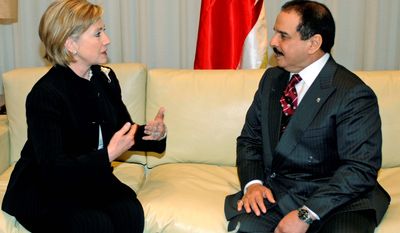 ** FILE ** U.S. Secretary of State Hillary Rodham Clinton meets with Bahraini King Hamad bin Isa al-Khalifa on the sidelines of the Egypt-hosted international conference on rebuilding Gaza, in Sharm el-Sheik, Egypt, in March 2009. (AP Photo/U.S. Embassy in Egypt, Sameh Refaat)