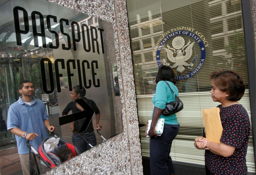 People wait in line outside the U.S. Passport Office in downtown Washington in this file photo. (Associated Press)