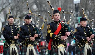 Members of Washington DC Fire Department Pipe and Drum Band participate in this year&#x27;s 38th annual Washington DC St. Patrick&#x27;s Day Parade which is held along Constitution Avenue.(Astrid Riecken/The Washington Times)