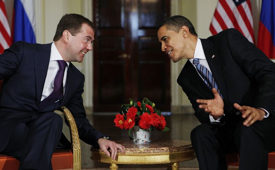 President Barack Obama meets with Russia's President Dmitry Medvedev at Winfield House in London, Wednesday, April 1, 2009. (AP Photo/Charles Dharapak)