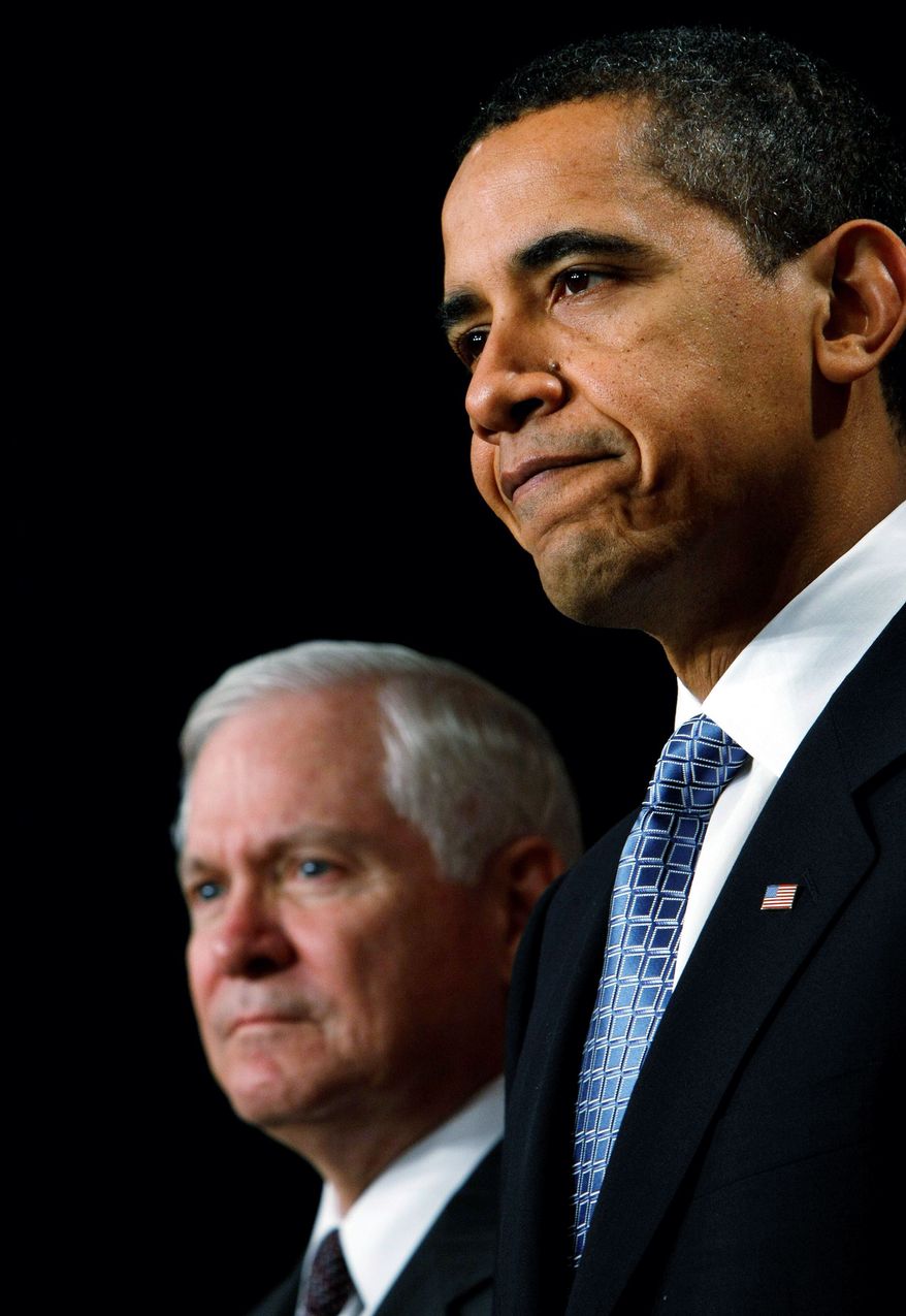 **FILE** President Obama and Defense Secretary Robert M. Gates (Associated Press)