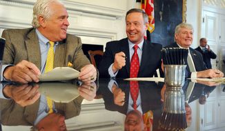 After the end of the General Assembly session in Annapolis, Gov. Martin O&amp;#39;Malley (center) signs a bill into law Tuesday with Speaker of the House Michael E. Busch (right) and Senate President Thomas V. Mike Miller Jr. in attendance. One new law gives Maryland first chance to buy the Preakness horse race to keep it in the state. (Associated Press)