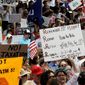 A crowd rallies Wednesday during a “Don&#x27;t Mess With Texas”-themed “tea party” in Austin, Texas. (Associated Press)