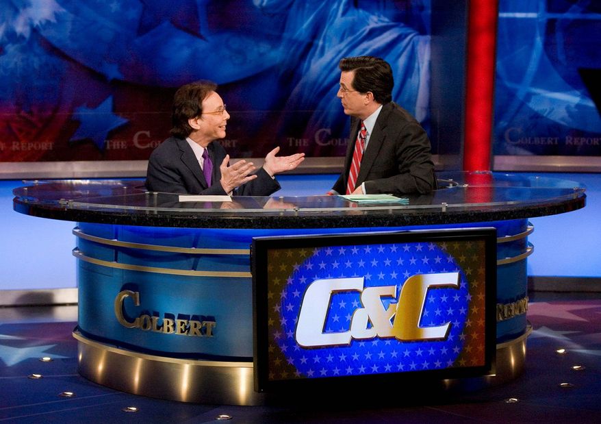 ** FILE ** Alan Colmes, left, appears with host Stephen Colbert on the set of "The Colbert Report." (Associated Press)