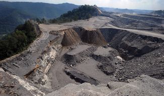 Association Press
Coal River Mountain (left) forms the backdrop for a mountaintop coal-mining site at Kayford Mountain, W.Va. 
