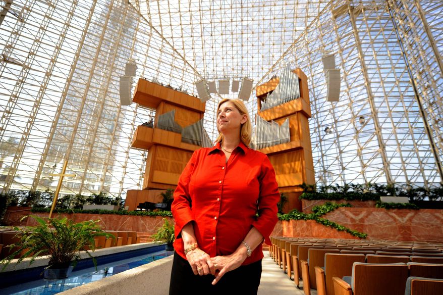 ** FILE ** The Rev. Sheila Schuller Coleman stands in the Crystal Cathedral, which her father, the Rev. Robert H. Schuller, built in Garden Grove, Calif. (AP Photo)