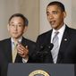 President Barack Obama, accompanied by Energy Secretary Steven Chu, delivers remarks on the energy bill, Monday, June 29, 2009, in the Grand Foyer of the White House in Washington. (AP Photo/Pablo Martinez Monsivais)