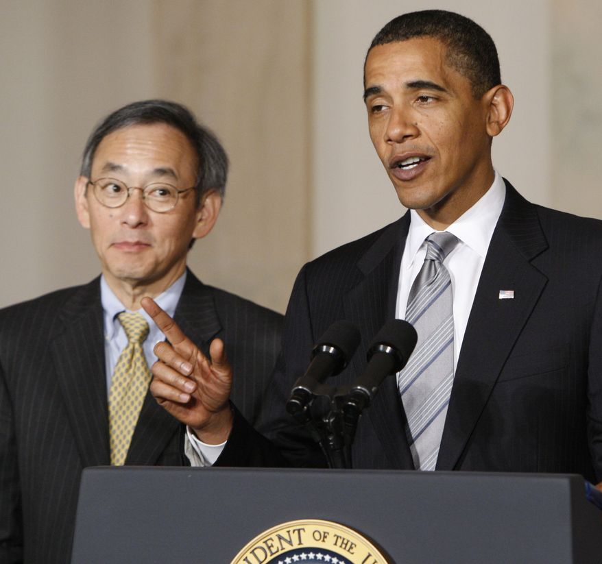 President Barack Obama, accompanied by Energy Secretary Steven Chu, delivers remarks on the energy bill, Monday, June 29, 2009, in the Grand Foyer of the White House in Washington. (AP Photo/Pablo Martinez Monsivais)