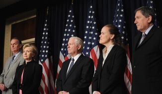 GETTY IMAGES
Secretary of Defense Robert M. Gates and Undersecretary of Defense for Policy Michele A. Flournoy are spearheading efforts to develop new defenses for military computer networks.