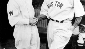 No Washington team has made the playoffs in the 77 years since Hall-of-Famer Joe Cronin (right, shown with Bucky Harris) was dealt to the Boston Red Sox in 1934. (Associated Press)
