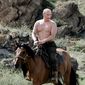AGENCE FRANCE-PRESSE/GETTY IMAGES
The London Times&#39; Tony Halpin suspects Russian women will be swooning over photos of Prime Minister Vladimir Putin riding horseback bare-chested.