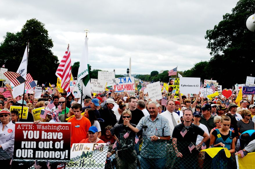 **FILE** An enormous crowd takes part in the Sept. 12 march on Washington to protest government spending and health care reform proposals. The field plan for a series of grassroots demonstrations Tuesday to push President Obama's health care agenda show the events will be tightly scripted with plans for "escalation," but organizers insist there is no comparison to rowdy town hall meetings and "tea party" protests challenging White House policies that they say conservatives staged. (Mary F. Calvert/The Washington Times)