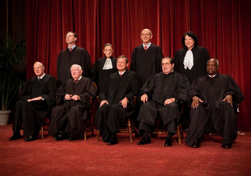 The justices of the U.S. Supreme Court pose for a portrait on Monday, Sept. 29, 2009. Pictured are (top row, left to right) Associate Justices Samuel A. Alito Jr., Ruth Bader Ginsburg, Stephen G. Breyer, Sonia Sotomayor, (bottom row, left to right) Anthony M. Kennedy and John Paul Stevens; Chief Justice John G. Roberts Jr.; and Associate Justices Antonin Scalia and Clarence Thomas. (Allison Shelley/The Washington Times)