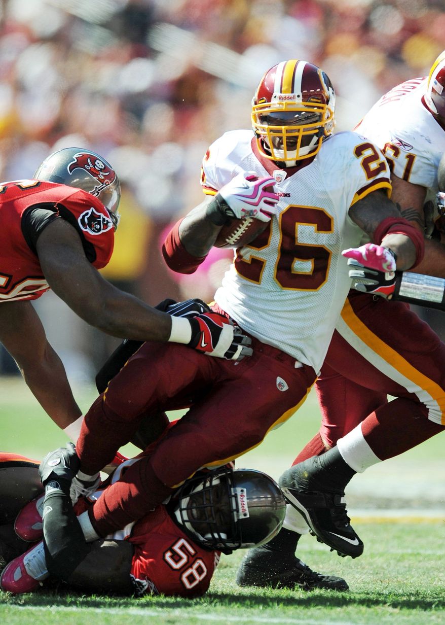 Peter Lockley / The Washington Times
Clinton Portis ran for 98 yards on 25 carries Sunday against the Buccaneers.