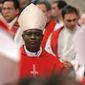 ** FILE ** Cardinal Peter Kodwo Appiah Turkson of Ghana attends a Mass for Pope John Paul II in St. Peter&#x27;s Basilica at the Vatican on April 13, 2005. (AP Photo/Pier Paolo Cito, File)