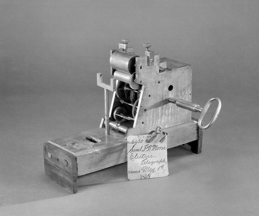 President Obama has placed examples of American inventions on his office shelves, including Samuel F.B. Morse's 1849 patent model of his Electric Telegraph. (Associated Press/Smithsonian Institution)