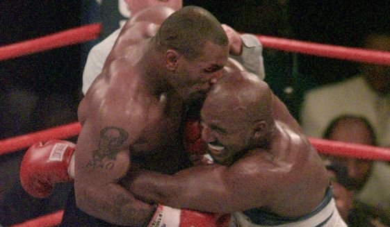 Mike Tyson and Evander Holyfield, seen here in the 1997 match when Mr. Tyson bit off part of Mr. Holyfield&#39;s ear, will meet Friday on &quot;The Oprah Winfrey Show.&quot; **FILE**