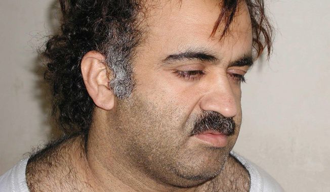 **FILE** Khalid Sheikh Mohammed, the alleged Sept. 11 mastermind, is seen shortly after his capture during a raid in Pakistan in March 2003. (Associated Press)