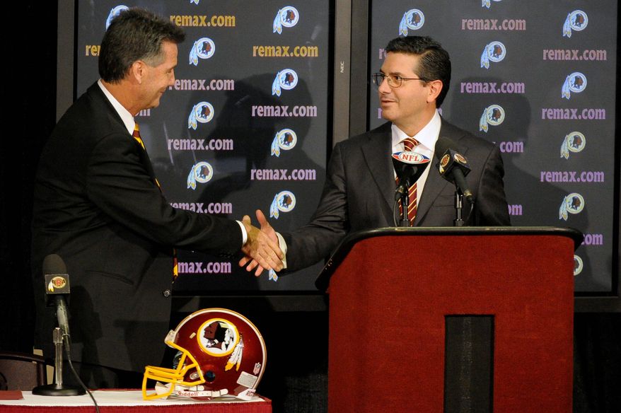 Peter Lockley/The Washington Times
Bruce Allen (left) shakes hands with Washington Redskins owner Dan Snyder as he is introduced Thursday at Redskin Park as the team's new executive vice president and general manager.
