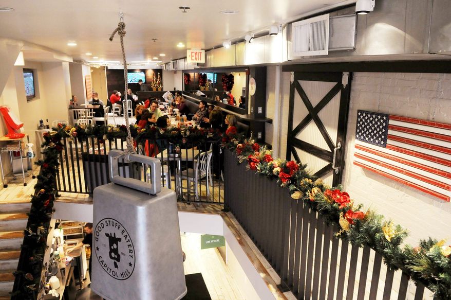 Customers eat in the dining area upstairs, at the Good Stuff Eatery in Washington, D.C., Tuesday, Dec. 15, 2009. (Rod Lamkey Jr./The Washington Times ) ** FILE **