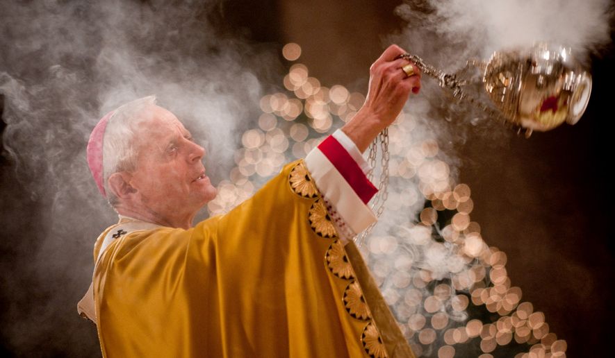 Archbishop of Washington Donald W. Wuerl celebrates Christmas Day Mass at the Basilica of the National Shrine of the Immaculate Conception in Washington in 2009.