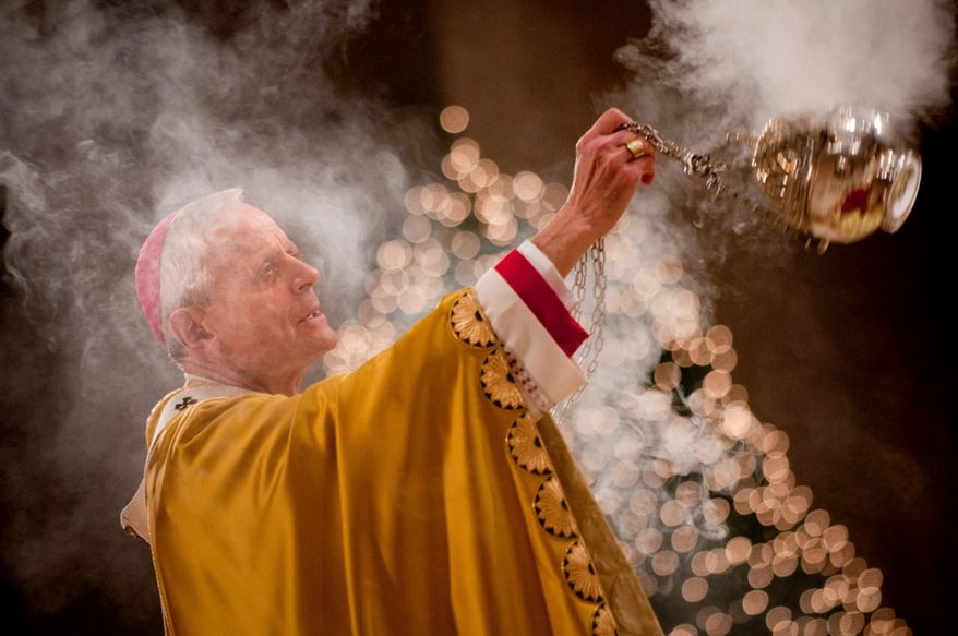 Archbishop of Washington Donald W. Wuerl celebrates Christmas Day Mass at the Basilica of the National Shrine of the Immaculate Conception in Washington in 2009.