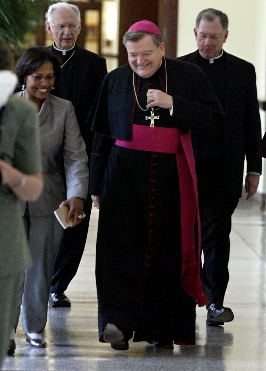 U.S. Archbishop Raymond L. Burke (center) has been prefect of the Supreme Tribunal of the Apostolic Signatura in Rome since 2008. He could be named a cardinal this year. (Associated Press)