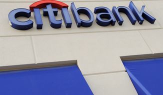 A Citibank sign is seen outside an office in Woburn, Mass., in 2009. (Associated Press)