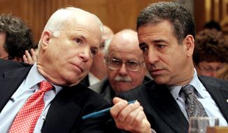 FILE - In this Jan. 25, 2006 file photo, Sen. John McCain, R-Ariz., left, chats with Sen. Russ Feingold, D-Wis. on Capitol Hill in Washington. The Supreme Court did not scale back the hard-won 2002 Bipartisan Campaign Reform Act, also named the McCain-Feingold law after its sponsors, and let corporations, unions and wealthy individuals pour money into elections in time for this year&#x27;s congressional races, not to mention the 2012 presidential contest; a ruling is expected as early as Tuesday, Jan. 12, 2010. (AP Photo/Lauren Victoria Burke, File)
