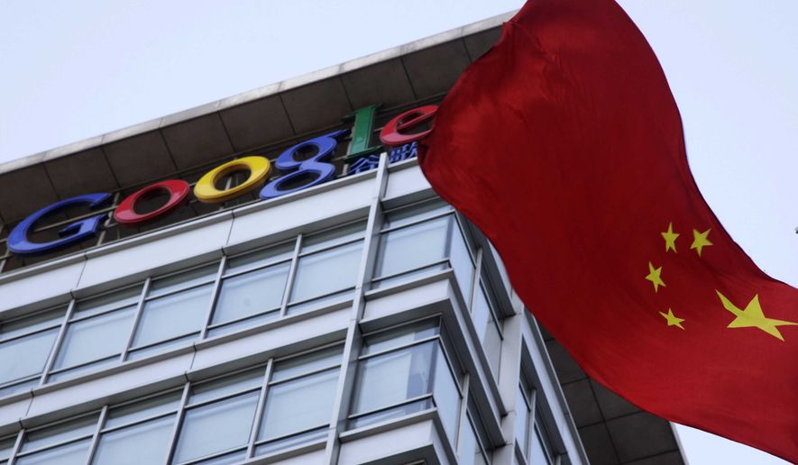A Chinese flag flutters outside Google&#x27;s China headquarters in Beijing on Friday, Jan. 22, 2010. Google closed its China-based search engine last year after complaining of cyberattacks from China against its e-mail service. (File, AP Photo/Ng Han Guan)