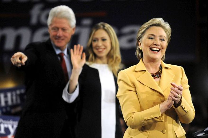 Hillary Rodham Clinton, with husband Bill and daughter Chelsea (The Washington Times) **FILE** 