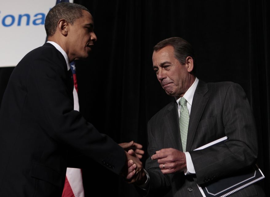 
President Barack Obama is greeted by House Minority Leader John Boehner of Ohio, before speaking to Republican lawmakers at the GOP House Issues Conference, in Baltimore, Friday, Jan. 29, 2010. (AP Photo/Charles Dharapak)
