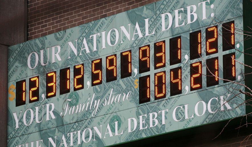 **FILE** The National Debt Clock is shown in New York on Feb. 1, 2010. (Associated Press)