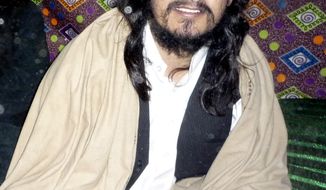 ** FILE ** In this Nov. 26, 2008, file photo, Pakistani Taliban leader Hakimullah Mehsud is seen in Orakzai tribal region of Pakistan. The Pakistani army says it is investigating reports that Mehsud has died from injuries sustained in a U.S. drone missile strike. Pakistani army spokesman Gen. Athar Abbas says the army is using its agents in Pakistan&#39;s northwest where the death is reported to have occurred to try to confirm or deny the reports. (AP Photo/Ishtiaq Mehsud, File)