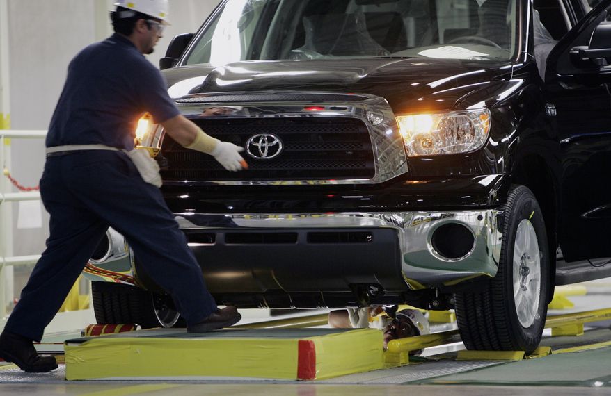 ** FILE ** In this Nov. 15, 2006, file photo, a Toyota Tundra is inspected during the final stages of assembly at the Toyota Manufacturing Texas, Inc. in San Antonio. (AP Photo/Eric Gay, file)