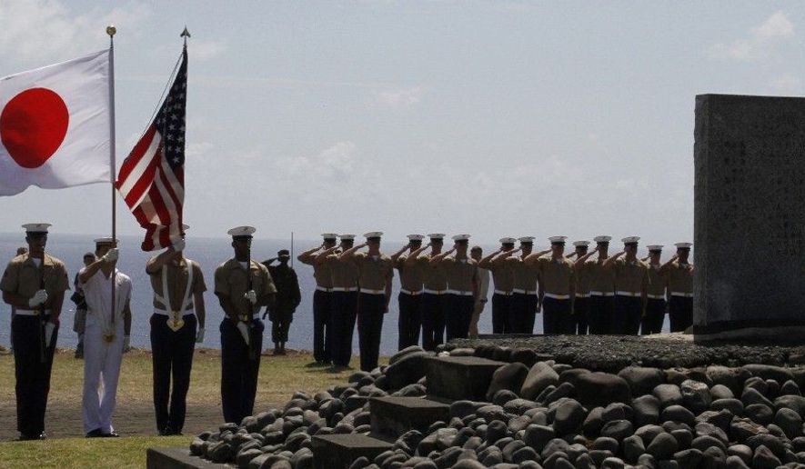 The Color Guard Holds Flags Of Japan And US During A Ceremony Commemorating