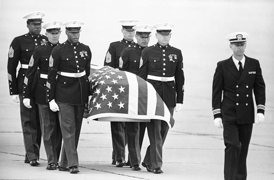 U.S. Marine Corps pallbearers carry the casket holding the body of Mr. Camarena after it arrived at North Island Naval Air Station in San Diego on March 8, 1985. Mr. Camarena is survived by his wife, Mika, and three children, Enrique, Daniel and Erick. He was given a hero's burial at Arlington National Cemetery.
