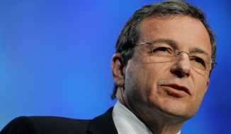 Bob Iger, president and CEO of the Walt Disney Co., delivers a keynote speech during the TelecomNEXT convention in Las Vegas on March 20, 2006. (AP Photo/Jae C. Hong, File)