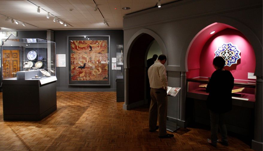 Pointed arches, narrow columns and soft lighting set a solemn but inviting mood at the permanent gallery of Islamic art in the Detroit Institute of the Arts. (Associated Press)