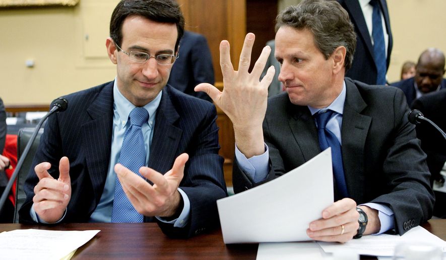 IN THE LINE OF FIRE: Office of Management and Budget chief Peter R. Orszag (left) and Treasury Secretary Timothy F. Geithner confer in March 2010 before testifying to a congressional panel. *FILE PHOTO* (Bloomberg News)