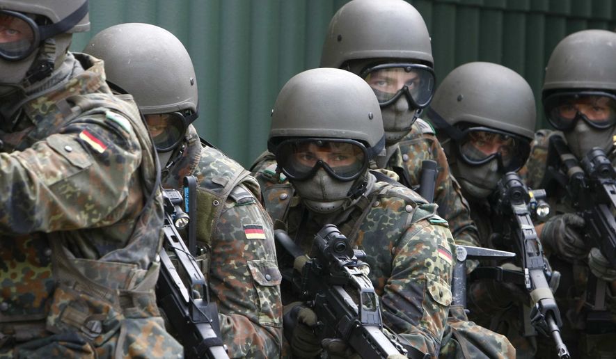 German Bundeswehr soldiers seen during a training in Seedorf, northern Germany on Aug. 25, 2008. (AP Photo/Joerg Sarbach, File) ** FILE ** 
