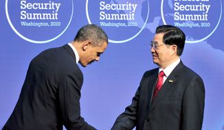 President Obama makes a courtesy bow to welcome Chinese President Hu Jintao to the Nuclear Security Summit in Washington earlier this week. A report by the CIA&#x27;s Weapons Intelligence, Nonproliferation and Arms Control Center links Chinese companies to nuclear and missile programs in Pakistan and missile programs in Iran. (Bloomberg News)
