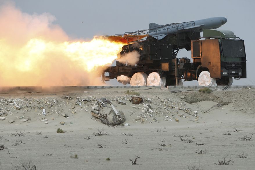 In this photo released by the semiofficial Iranian Fars News Agency, a Saegheh ground-to-sea missile is launched by the Iranian Revolutionary Guards during a maneuver at the eastern part of Strait of Hormuz, a strategic oil route in southern Iran, on Sunday, April 25, 2010. Iran's state television says the country has fired a series of missiles as part of an ongoing large-scale military maneuvers in the Persian Gulf and Strait of Hormuz. (AP Photo/Fars News Agency, Mehdi Marizad)