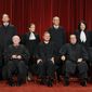 ** FILE ** In this Sept. 29, 2009, file photo, the Supreme Court poses for a portrait at the Supreme Court in Washington. Seated, from left are: Associate Justice Anthony M. Kennedy, Associate Justice John Paul Stevens, Chief Justice John G. Roberts, Associate Justice Antonin Scalia, and Associate Justice Clarence Thomas. Standing, from left are: Associate Justice Samuel Alito Jr., Associate Justice Ruth Bader Ginsburg, Associate Justice Stephen Breyer, and Associate Justice Sonia Sotomayor. Justice John Paul Stevens, the court&#39;s oldest member and leader of its liberal bloc, he is retiring. President Barack Obama now has his second high court opening to fill. (AP Photo/Charles Dharapak. File )