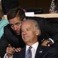 In this Aug. 25, 2008, photo, then-Democratic vice presidential candidate, Sen. Joseph R. Biden Jr. (right) is seen with his son, Delaware Attorney General Beau Biden, at the Democratic National Convention in Denver. (Associated Press) **FILE**