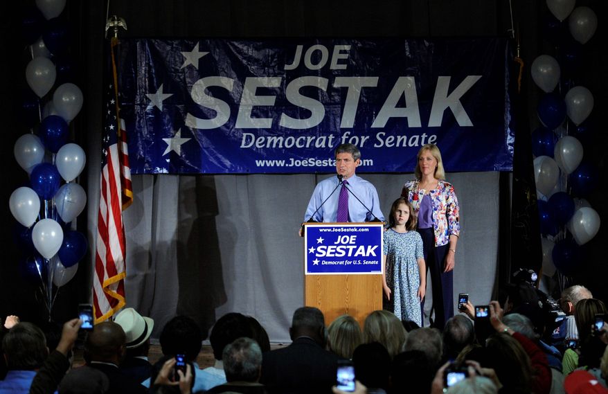 Sen. Joe Sestak, Pennsylvania Democrat, along with daughter Alex and wife Susan, speaks at a primary night event at the Valley Forge Military Academy & College in Wayne, Pa. He unseated incumbent Sen. Arlen Specter.