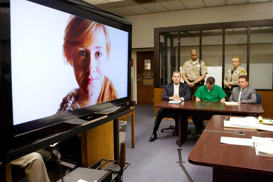 John Albert Gardner III (center, seated) lowers his head as a video presentation of Chelsea King is played during his sentencing May 14 in San Diego. Gardener, a sex offender who admitted murdering Chelsea and another teenage girl, was sentenced to life in prison without parole. (Associated Press)