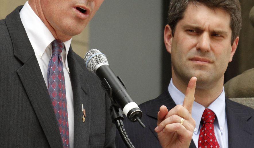 Tim Burns, right, Republican candidate for the congressional seat vacated by John Murtha, campaigns with Sen. Scott Brown, R-Mass., on the steps of the Washington County Courthouse in Washington, Pa., Friday, May 14, 2010. (AP Photo/Gene J. Puskar)